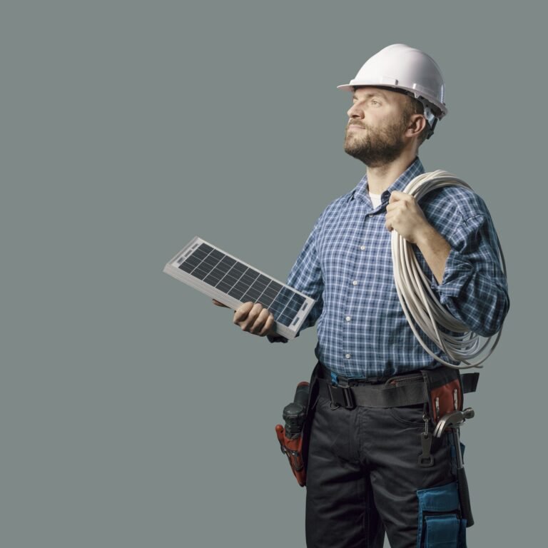 Electrical engineer holding a solar panel